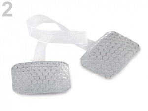 Magnetická spona na závěsy