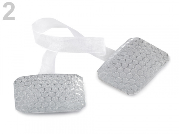 Magnetická spona na závěsy