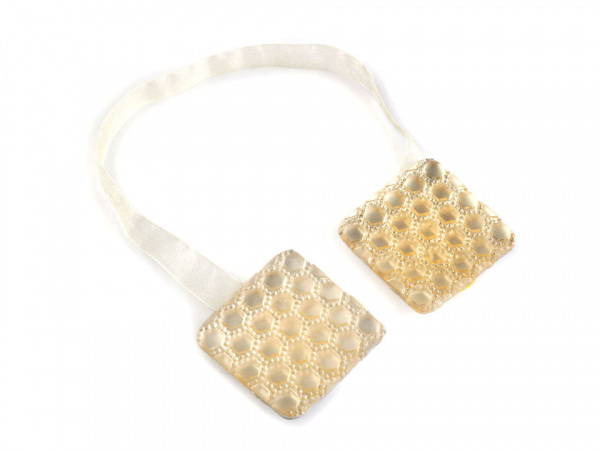 Magnetická spona na závěsy