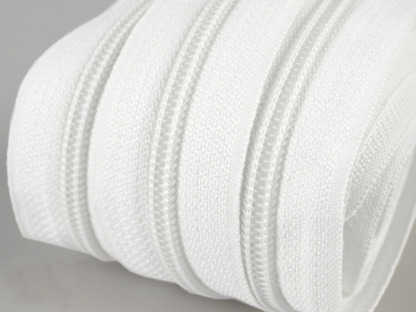 Zip spirálový 7mm metráž bílá pro jezdce typu POL