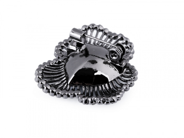 Brož s broušeným kamenem